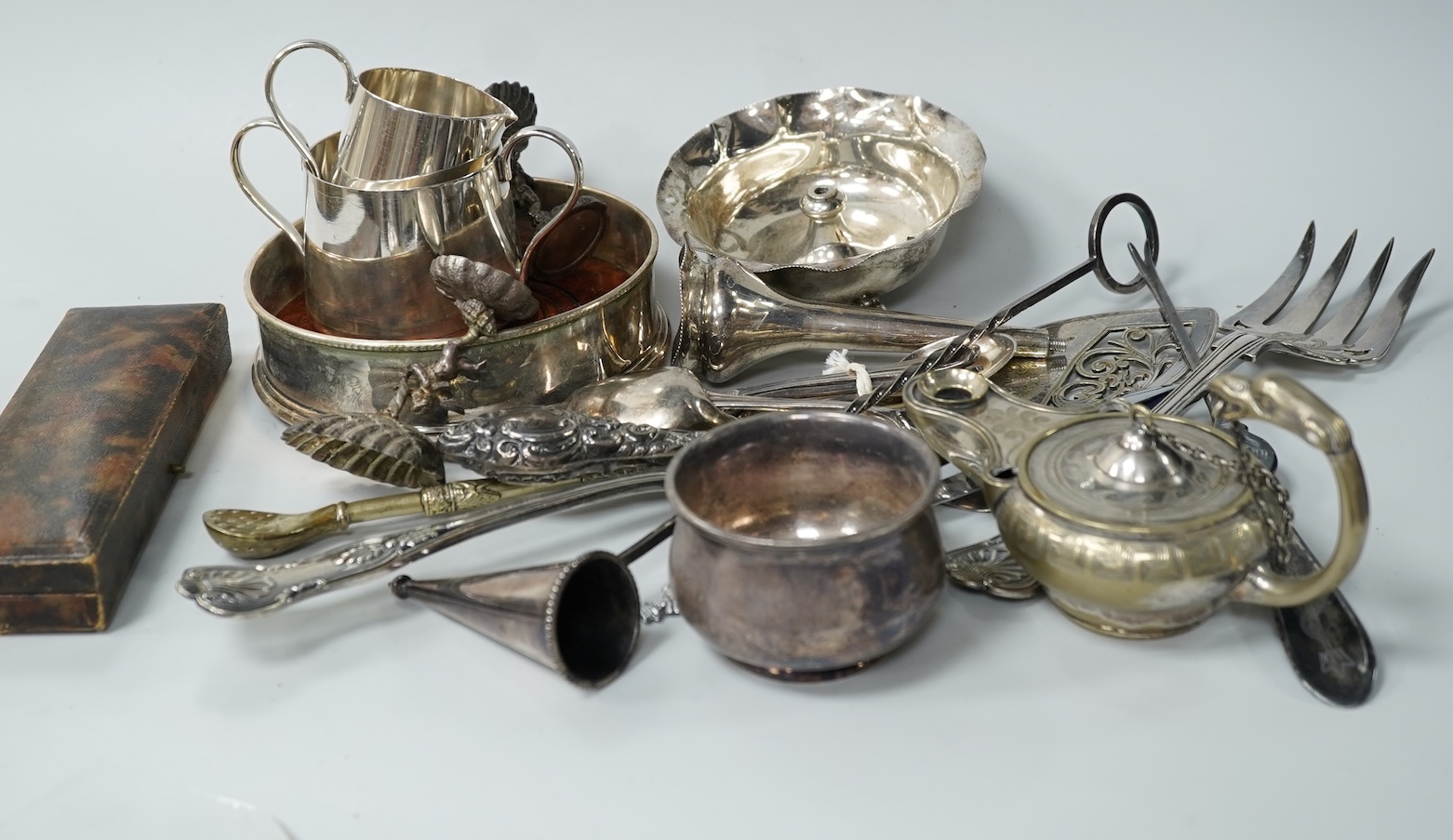 A collection of various plated wares and small silver
